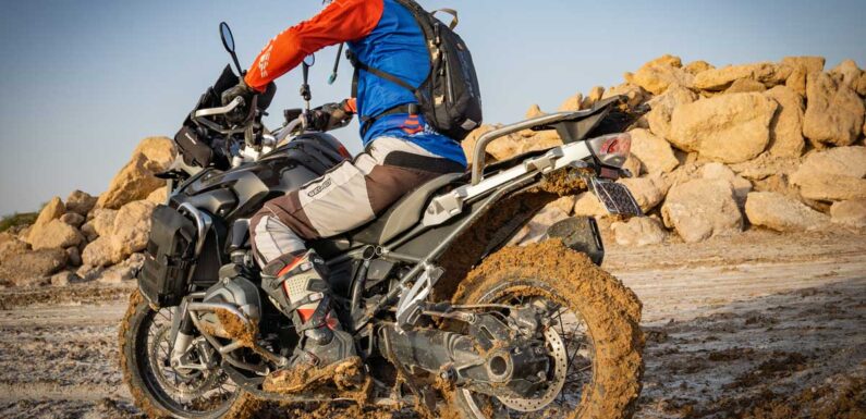 How do off-road riders prepare for unpredictable terrain conditions?
